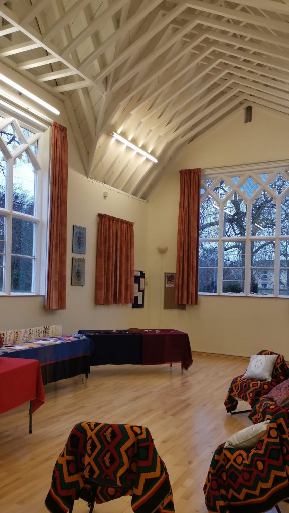 Four chairs facing the Reiki Teacher